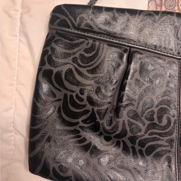 Hand painted one of a long grey and black clutch purse.